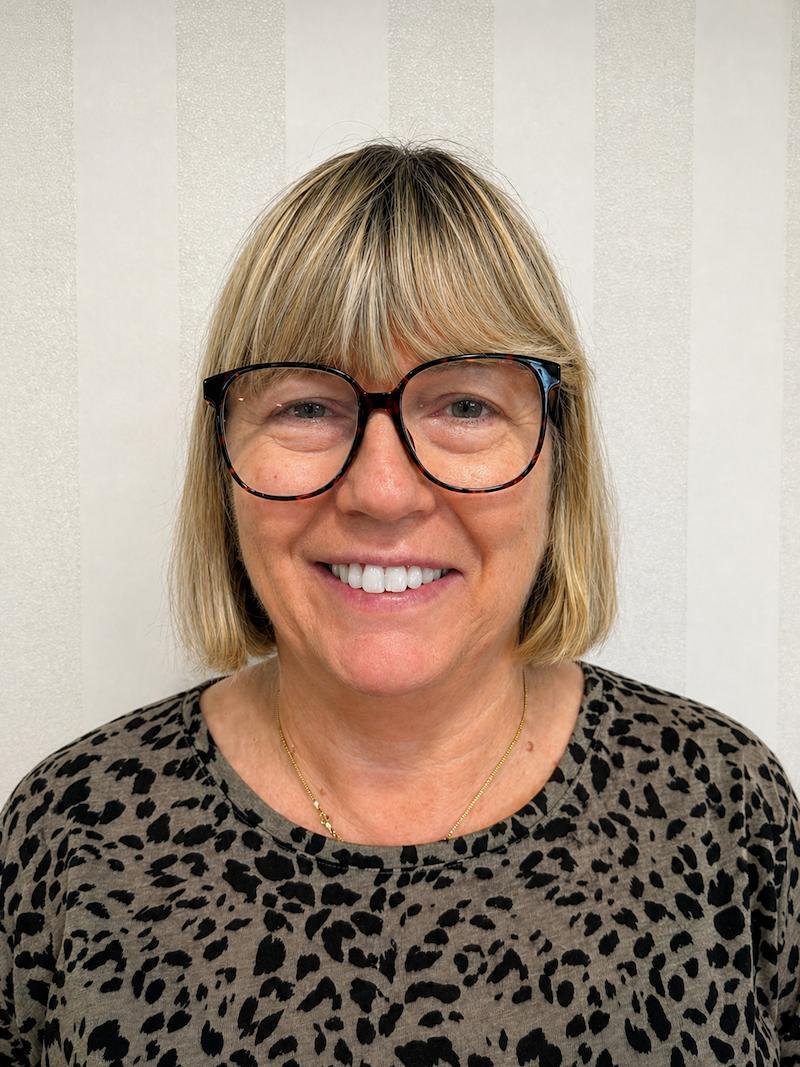 sue stephens the home manager smiling for her staff photo