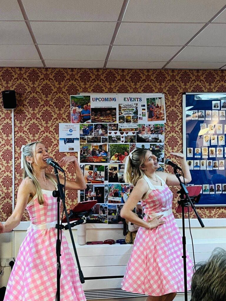 Georgie and Nelly from West Country Song Birds performing at the Dementia Café
