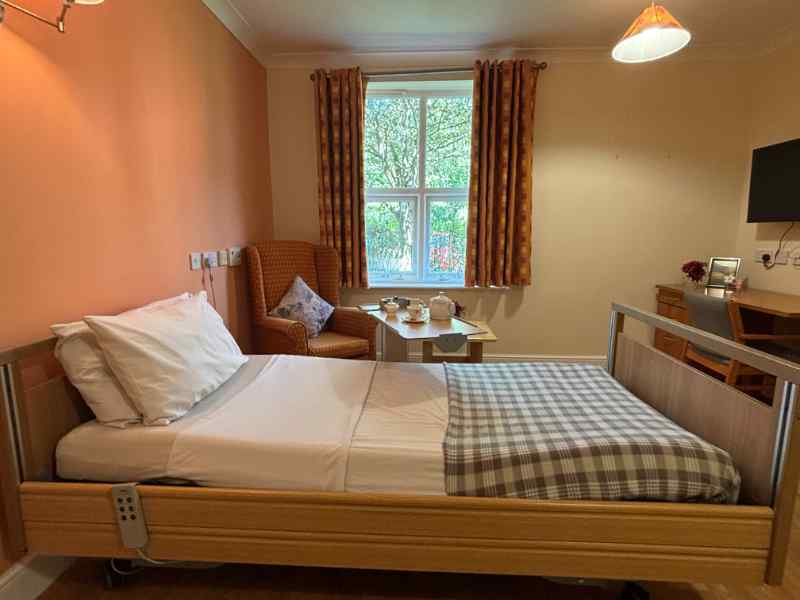 bedroom at immacolata house care home in seaton
